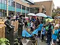 Trustees and school children rededicate Reaching Out statues by Carla Rutgers at Nord Anglia International School Rotterdam in the summer of 2022
