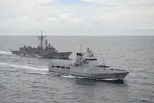 KDB Darulaman alongside USS Rodney M. Davis during CARAT 2014.