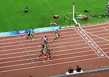 Image 18The 100 m final at the 2008 Summer Olympics (from Track and field)