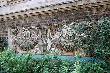 Beaux Arts festoons on an architectural element of the Palais des Beaux-Arts, part of the 1889 Paris Exposition, now in the Square Paul-Langevin, Paris, by Jules-Paul Loebnitz, 1889