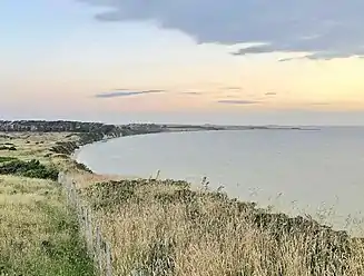 Waikato Point. Cliffs rise to about 30 m (98 ft) on the west coast of the lagoon