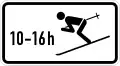 Skiers crossing road at times shown